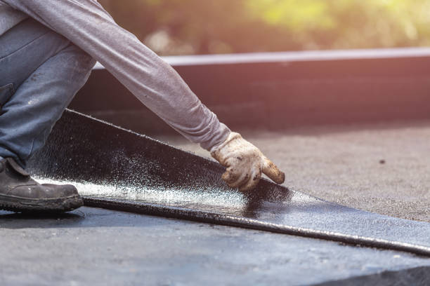 Professional Basement Waterproofing technician working in Ashley, IN